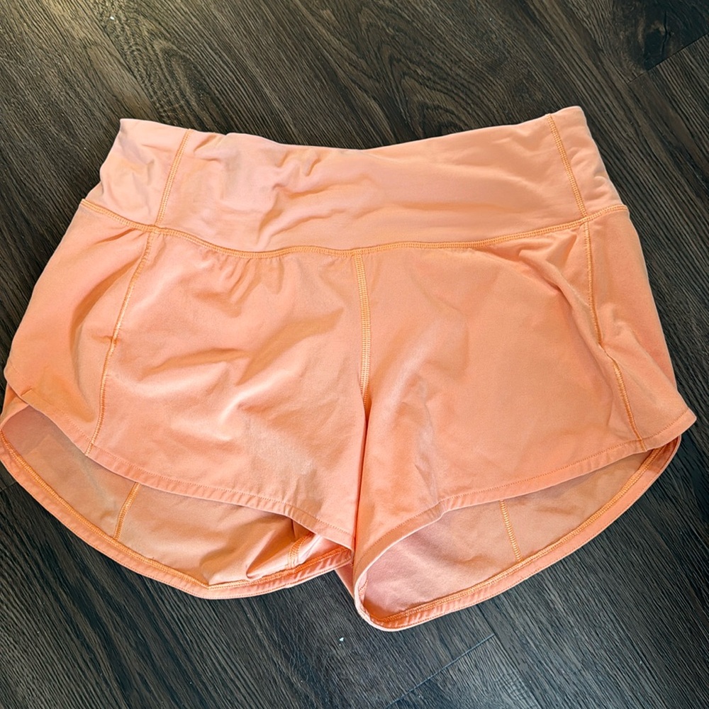 Lululemon Speed Up Orange Shorts size 4 Tall (4” inseam)